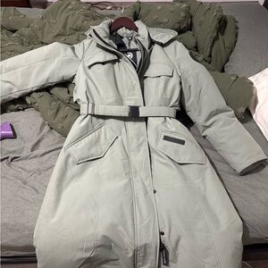 It was flown in from Canada last year and never worn. I don't wear